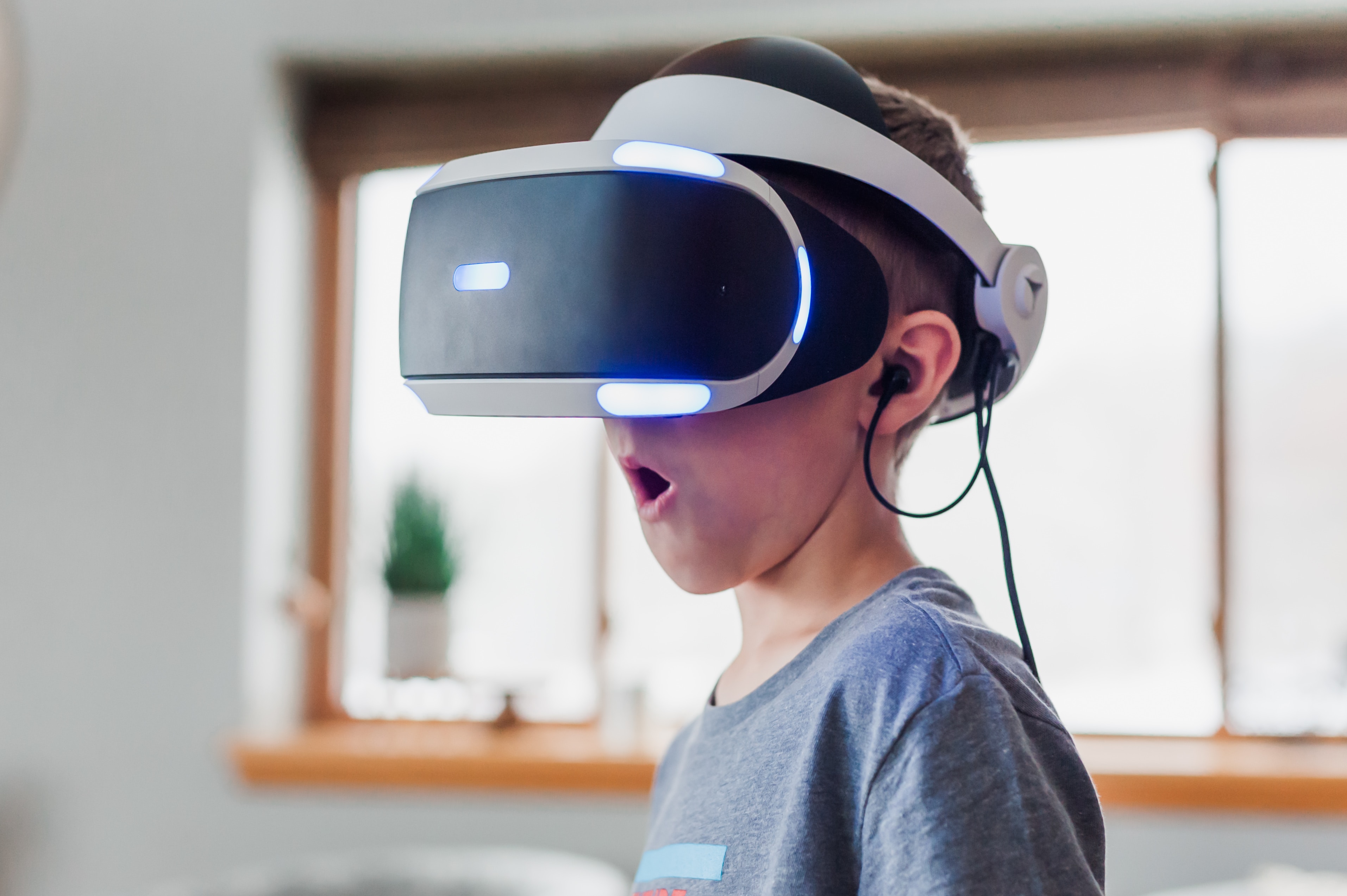 child with VR headset